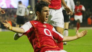 LONDON, UNITED KINGDOM:  Arsenal's Cesc Fabregas (Front) celebrates scoring against Rosenborg with teammate Jose Antionio Reyes during their Champions League football match at Highbury in London 07 December, 2004.     AFP PHOTO/JIM WATSON  (Photo credit should read JIM WATSON/AFP/Getty Images)